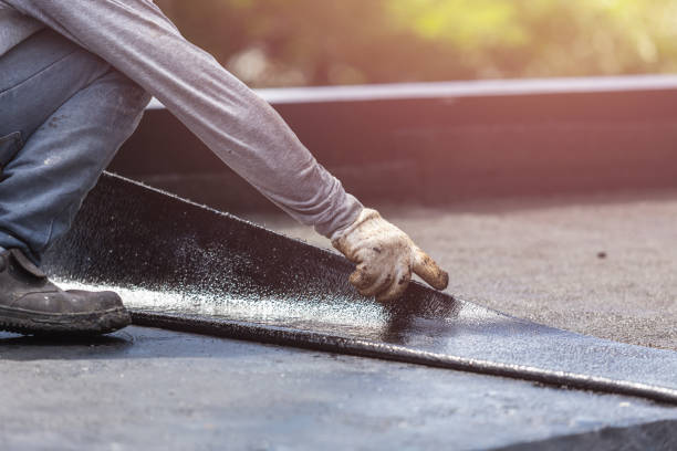 Professional Emergency Waterproofing technician working in Munford, AL